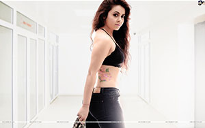 Indian TV actress Devoleena Bhattacharjee posing in her hot avatar